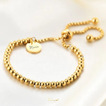 Cargar imagen en el visor de la galería, Pulsera Claires, personalizada en acero chapado en oro 18 k.